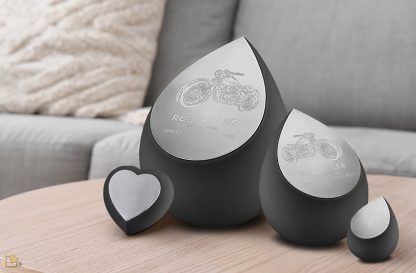 3 Teardrop shaped different sizes urns & a small heart shaped urn