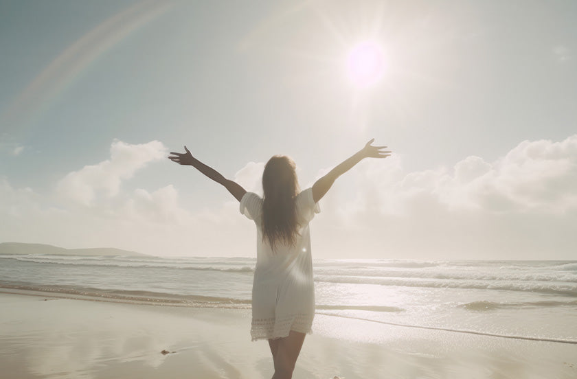 Person on beach enjoying life